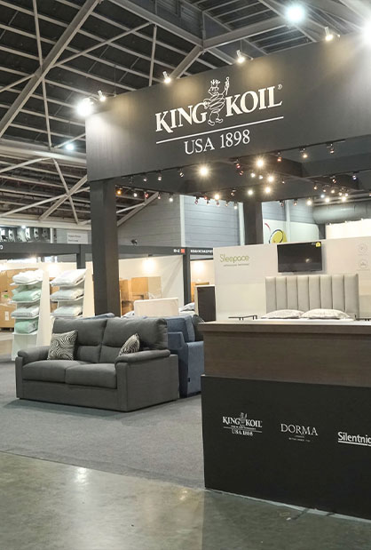 Modern exhibition stand design and booth fabrication for King Koil